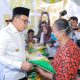 Pj. Gubernur Adhy Serahkan Santunan untuk 800 Anak Yatim dan Dhuafa